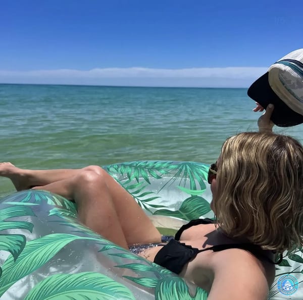 Young female looking for sea day activities